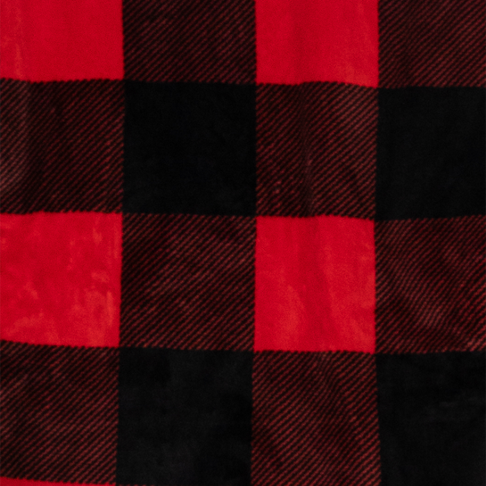 Red polar fleece chair blanket from City Bonfires, shown draped over a chair for warmth and comfort.