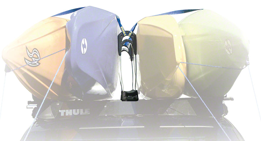Thule 830 The Stacker kayak carrier with QuickDraw straps securely holds multiple kayaks on a vehicle roof.