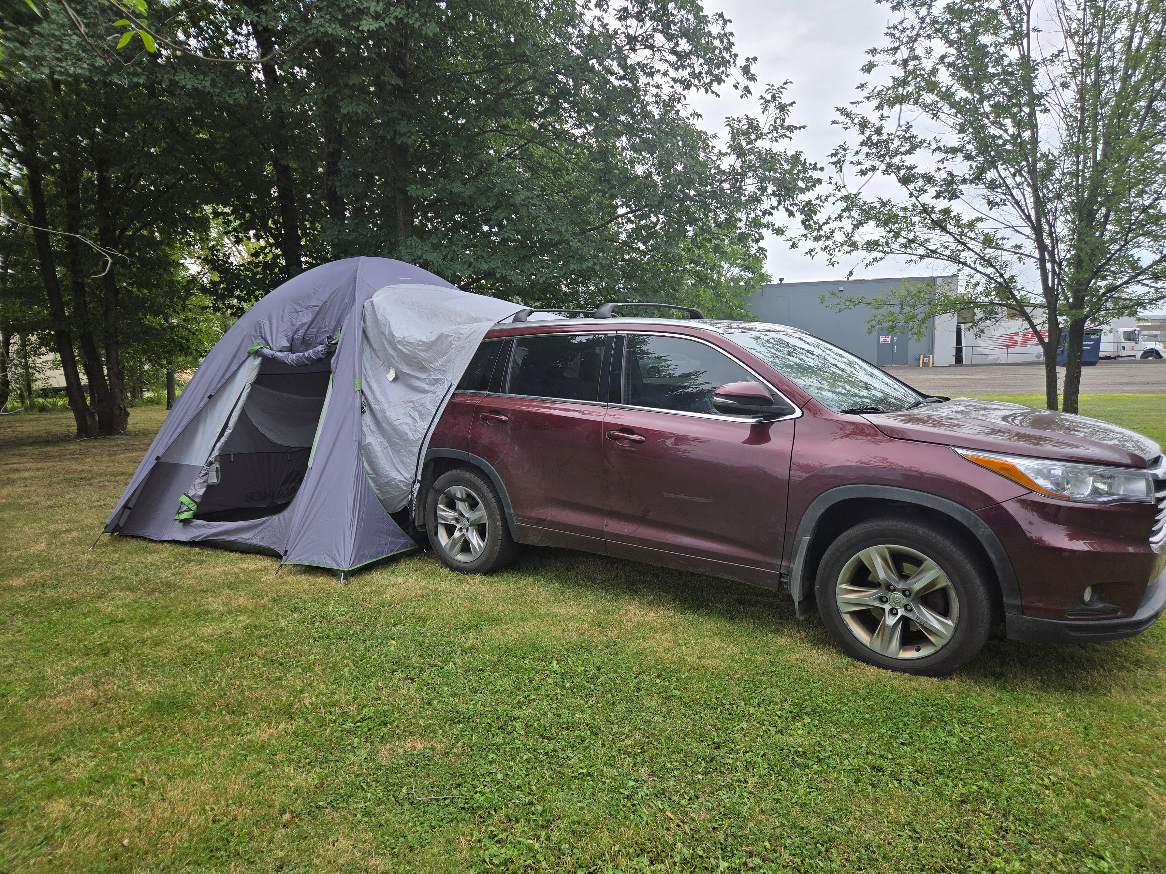 Backroadz SUV Tent by Backcountry Sportsman set up on a vehicle, showcasing spacious design and durable fabric for camping adventures.