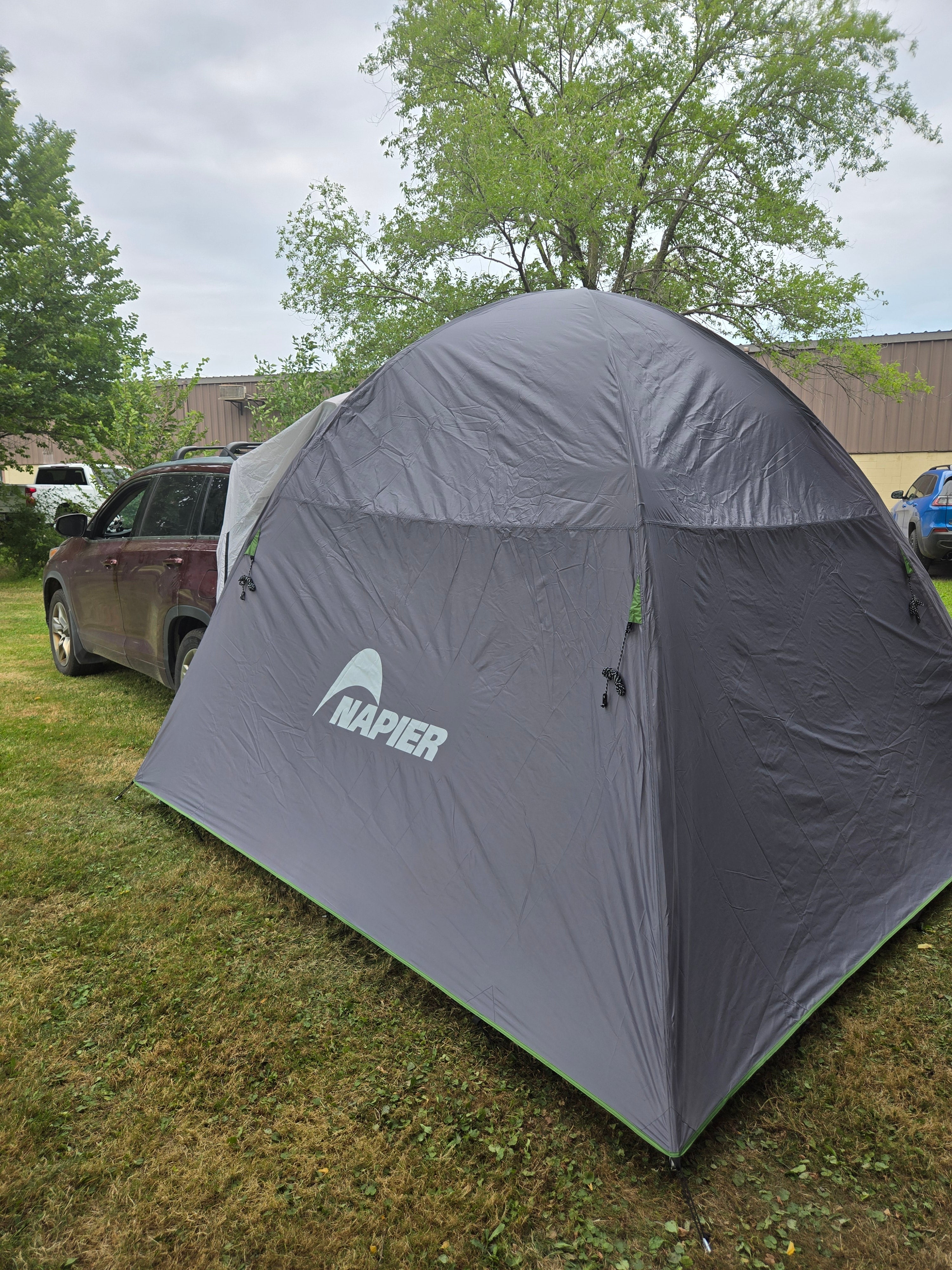 Backroadz SUV Tent by Backcountry Sportsman set up on an SUV, showing spacious interior and durable fabric for outdoor camping adventures.