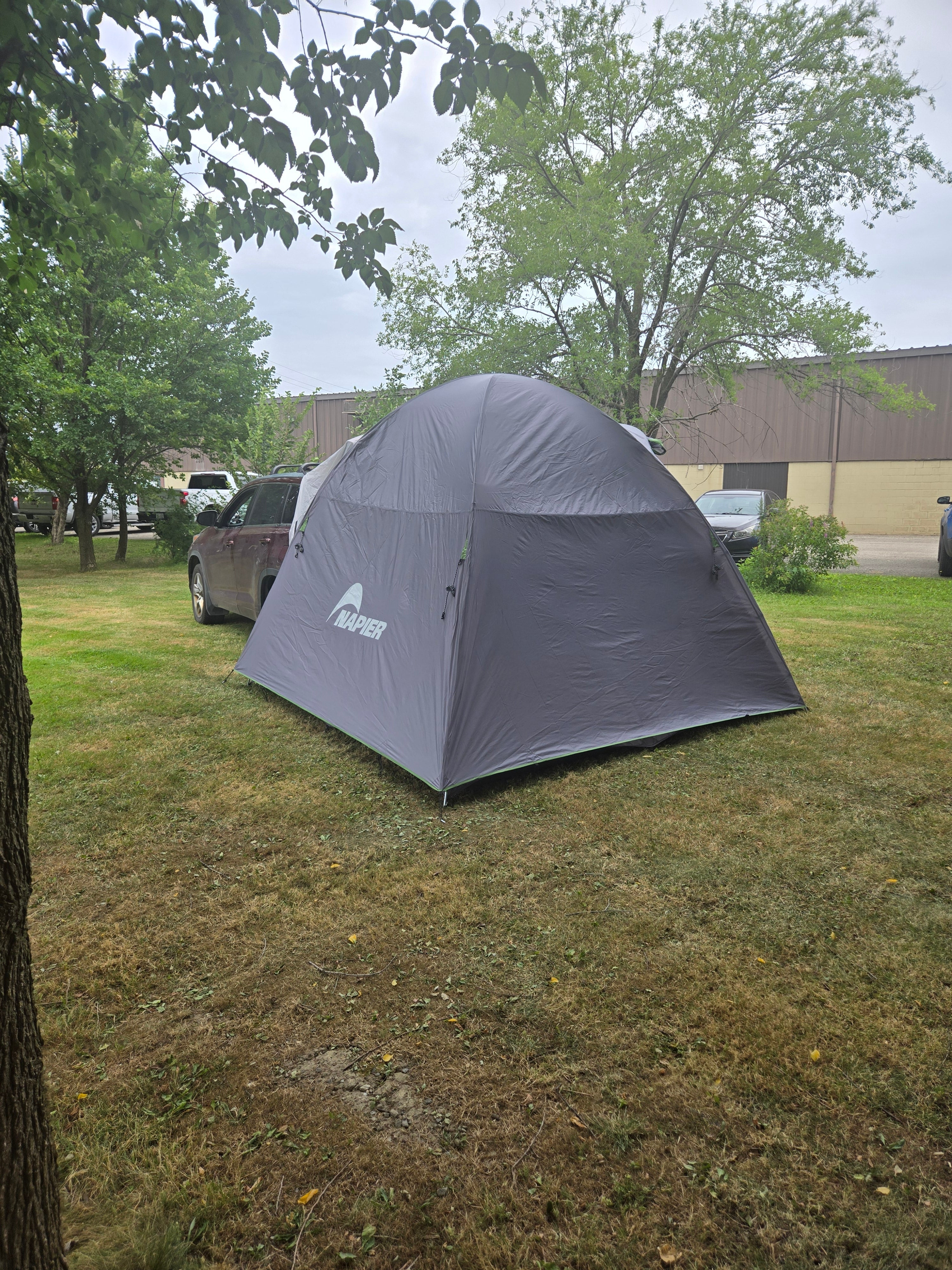 Backroadz SUV Tent by Backcountry Sportsman set up on a vehicle, showcasing ample interior space and waterproof fabric for camping outdoors.