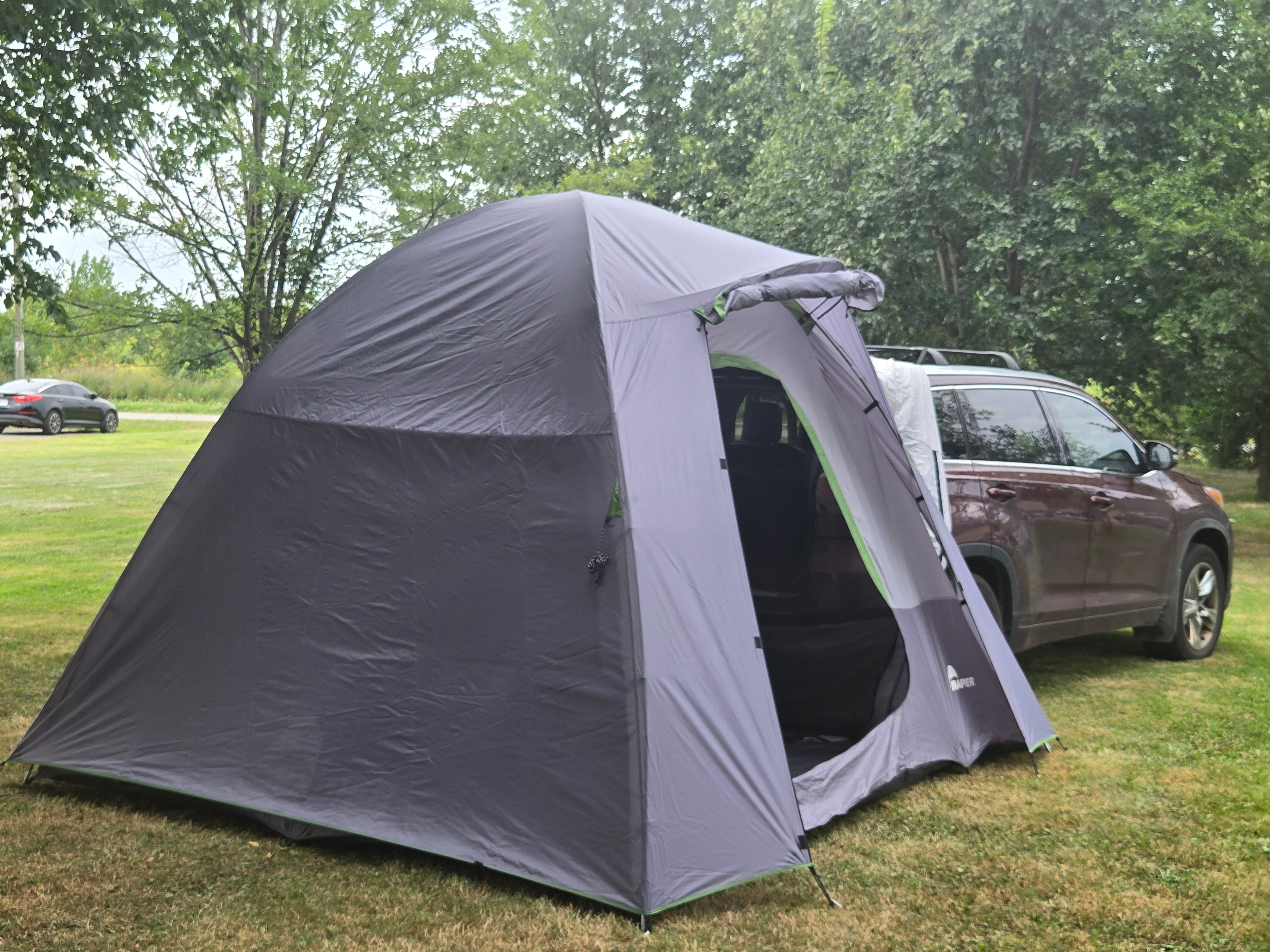 Backroadz SUV Tent by Backcountry Sportsman set up on a vehicle, showcasing its spacious design and easy attachment for outdoor camping.