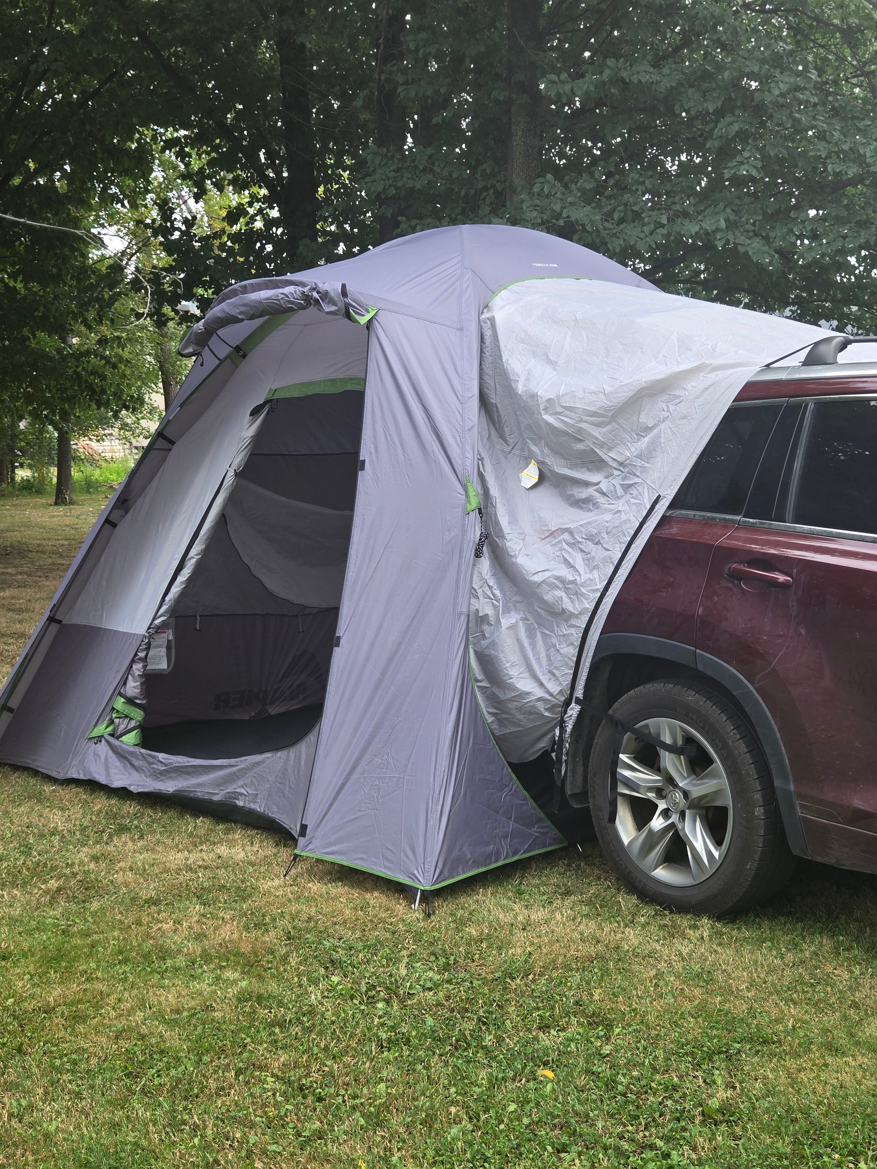 Backroadz SUV Tent by Backcountry Sportsman set up on an SUV, showing spacious interior and weather-resistant fabric for outdoor camping.