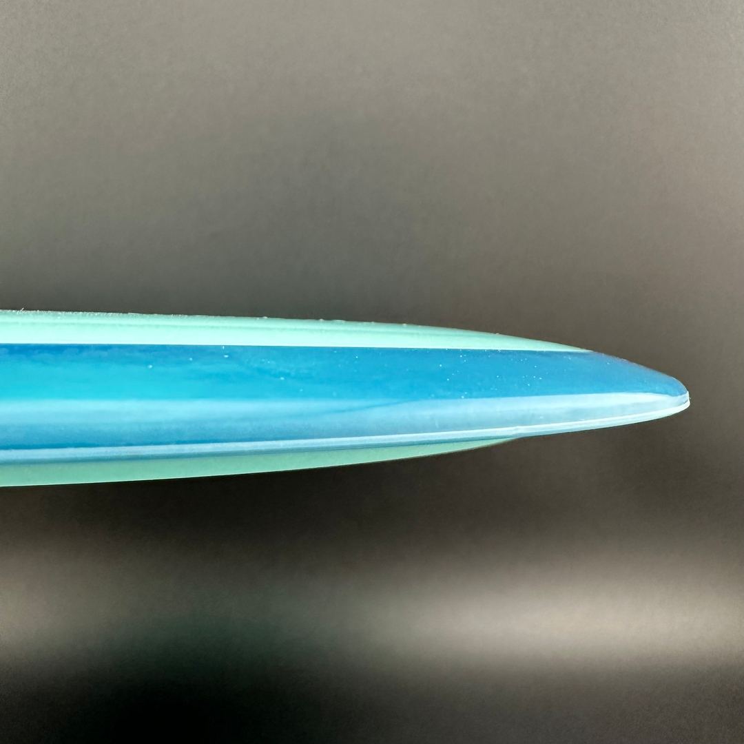 Rare Air Discs Fission Defy Crushin' Amanitas VIP 2.0 disc golf disc with vibrant design and bold branding.