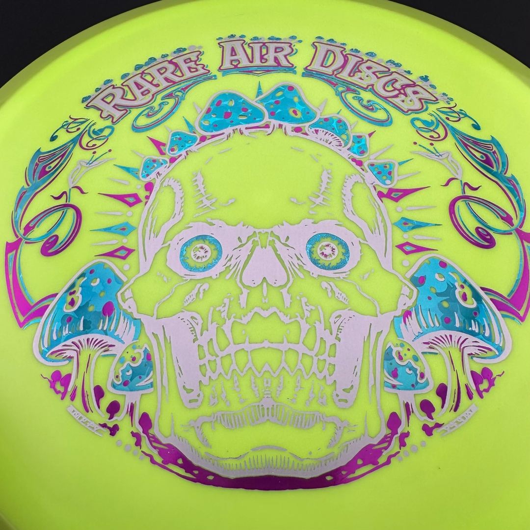 Rare Air Discs Fission Defy Crushin' Amanitas VIP 2.0 disc golf disc with vibrant graphics and lightweight plastic construction.