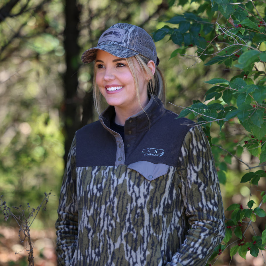Gianna 2.0 Pullover in Mossy Oak Bottomland camouflage by DSG OUTERWEAR, showing the outdoor camouflage pattern and pullover style.