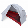 Near Zero Outdoor Gear 1P DynaLite Tent with rain cover set up outdoors, showcasing lightweight camping tent and protective rain gear.