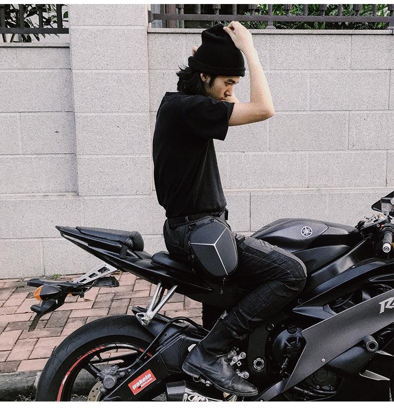Albers ShadowStrike motorcycle leg bag from Bean's Moto Booth, featuring durable black material and adjustable straps for secure wear.