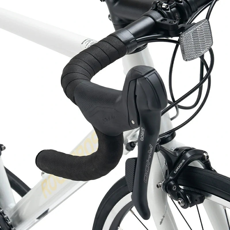 RockBros-US AERIX Aluminum Road Bike with lightweight frame, drop handlebars, and racing tires ready for speed and performance.