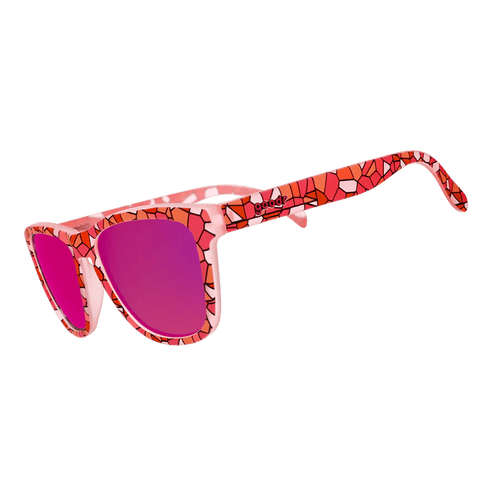 Side view of Rare Air Discs stained glass sex symbol polarized sunglasses with transparent frames and colorful stained glass design.