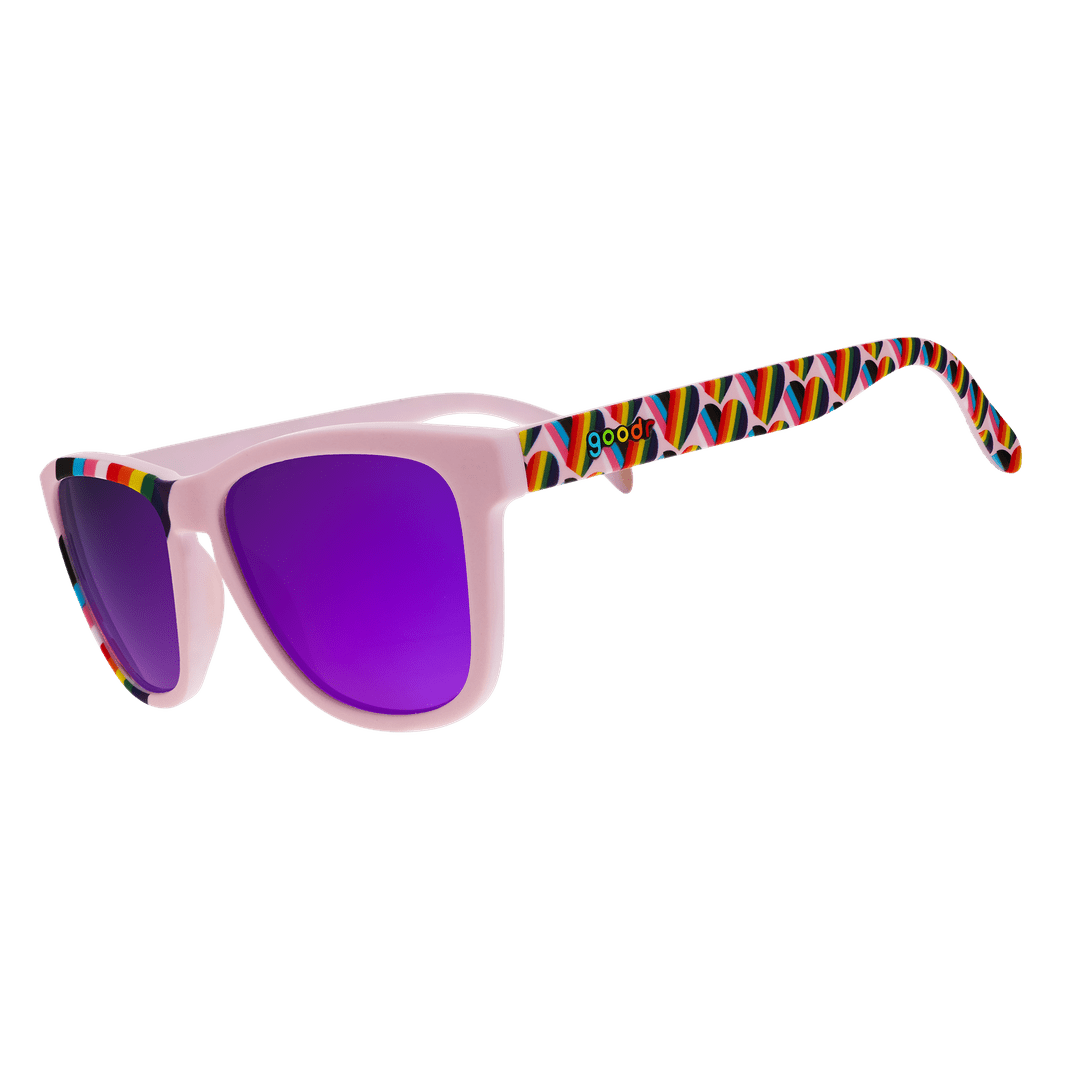 Transparent polarized sunglasses with "We're Here To Slay" logo, stylish accessories from Rare Air Discs for Pride Fest '25.