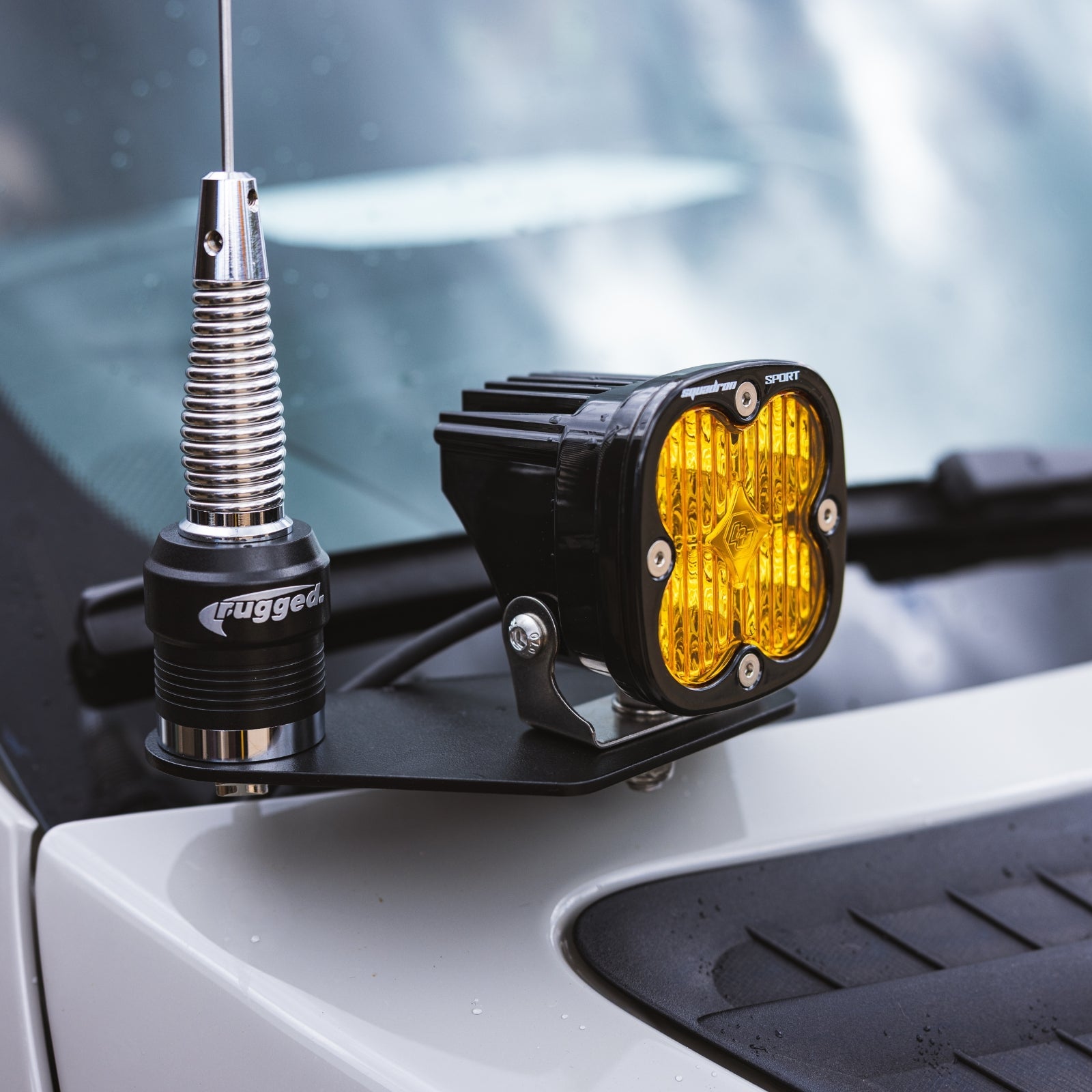Sprinter Hood Light Mount Kit by The Van Mart, showcasing sturdy metal brackets for easy light installation.
