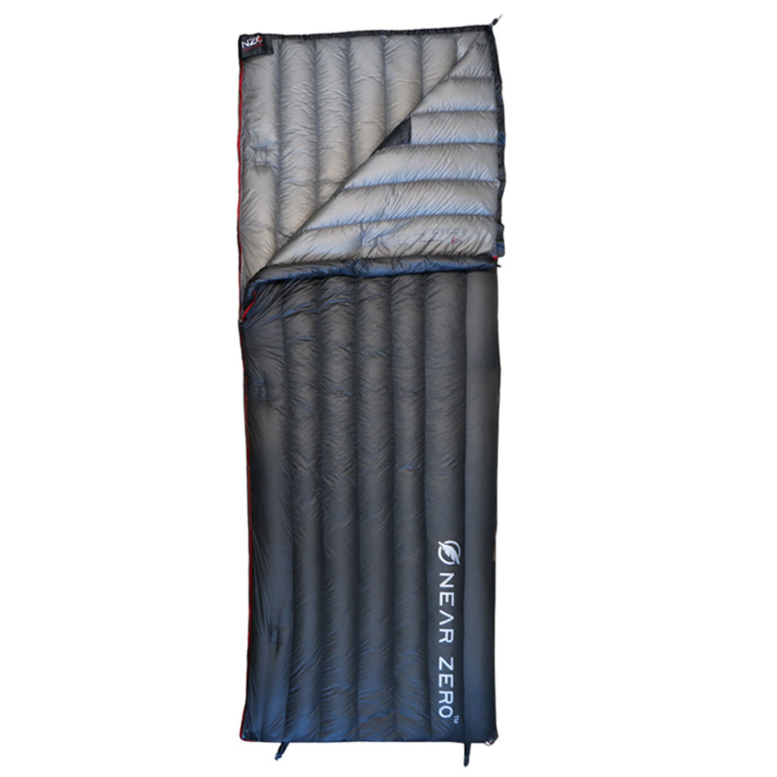Near Zero Outdoor Gear QUILT ONE sleeping bag, showcasing its cozy fabric and compact design for outdoor adventures.