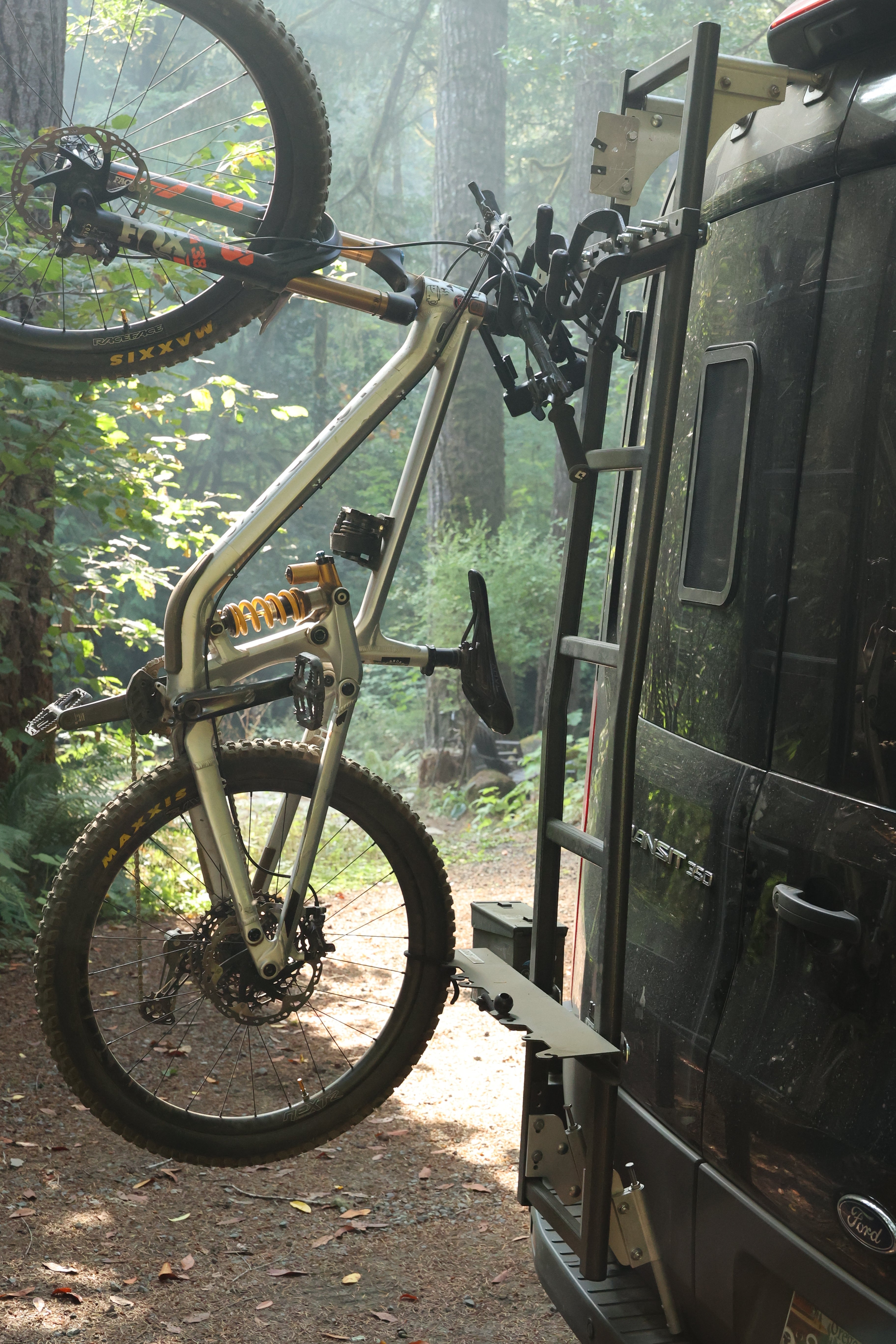 Lolo Racks Rad Lad rear ladder bike rack kit mounted on vehicle with multiple bicycles attached for transport.