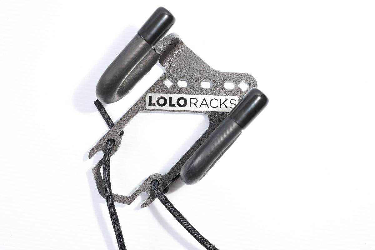 Lolo Racks L-track compatible single bike carrier DIY rack accessory showing metal mounting hardware and adjustable straps