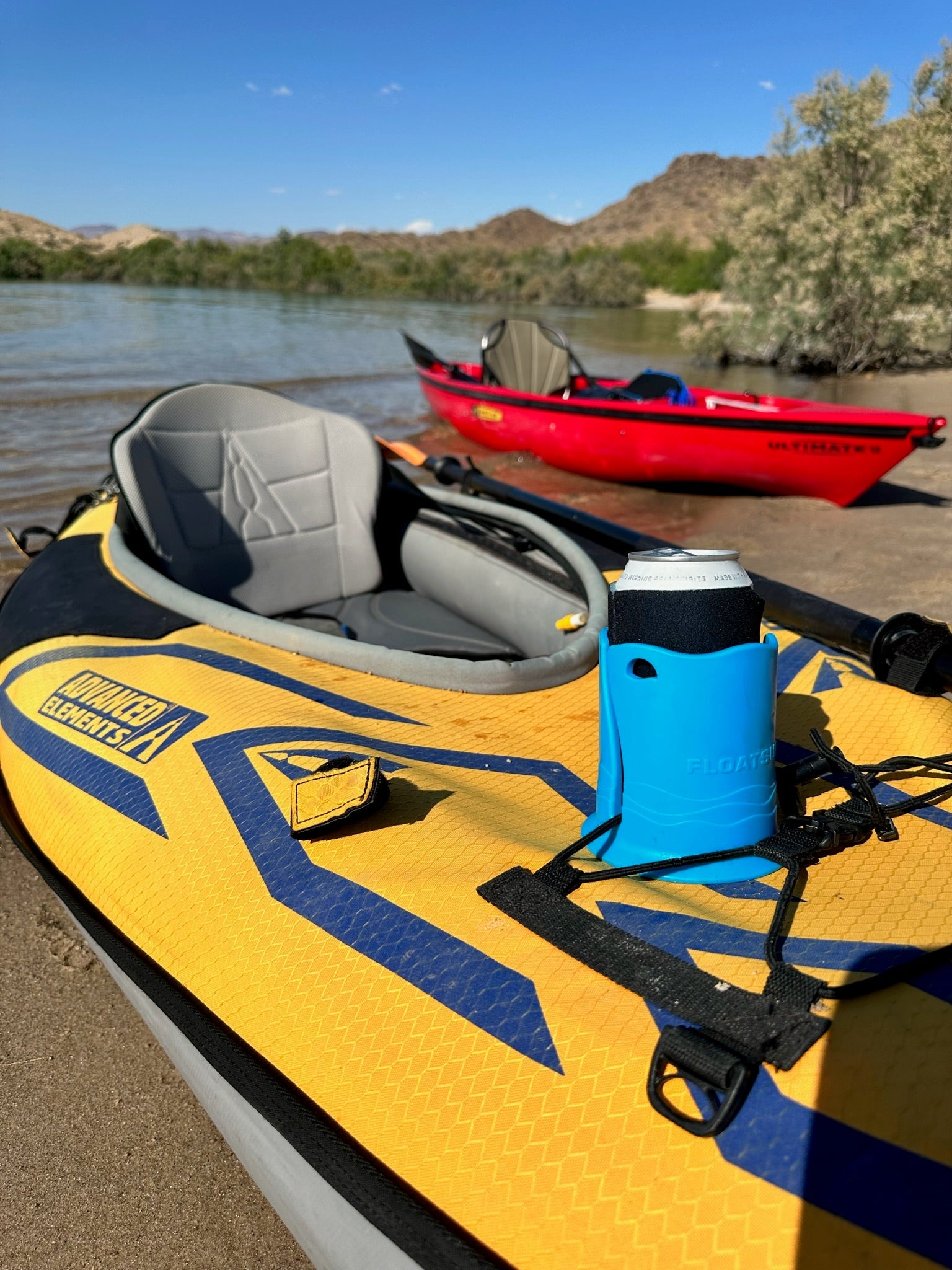 Floatsup® Cup Drink Holder for sporting goods, shown attached to a boat, holding a beverage cup in vibrant blue color.