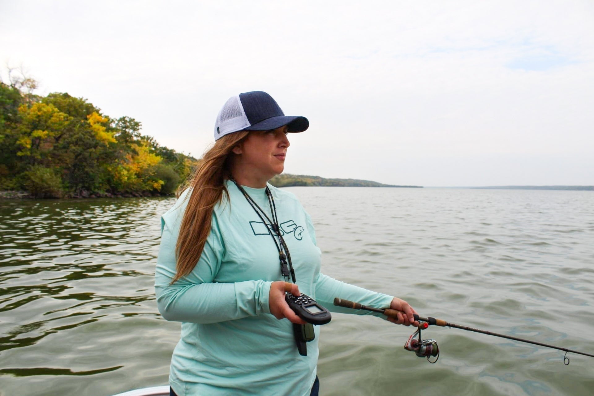 Solid fishing shirt from DSG OUTERWEAR with UPF 50+ sun protection, featuring long sleeves and lightweight breathable fabric.