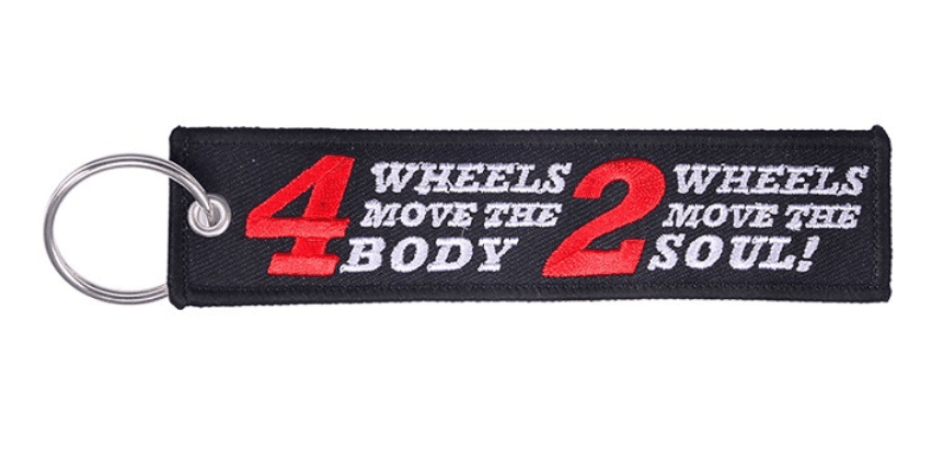 Embroidered motorcycle keychain decor by Bean's Moto Booth with detailed stitching and a vibrant motorcycle design.