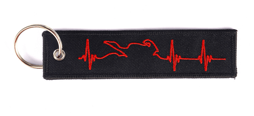 Embroidered motorcycle keychain decor by Bean's Moto Booth, featuring detailed stitching and vibrant design.