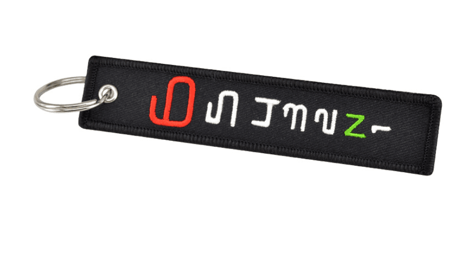 Embroidered motorcycle decor keychain by Bean's Moto Booth featuring detailed stitching and vibrant colors.