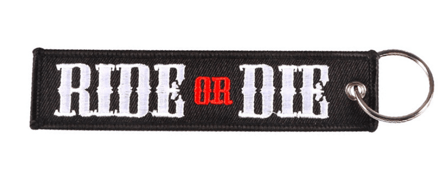 Embroidered motorcycle keychain decor from Bean's Moto Booth, featuring detailed stitching and vibrant colors.