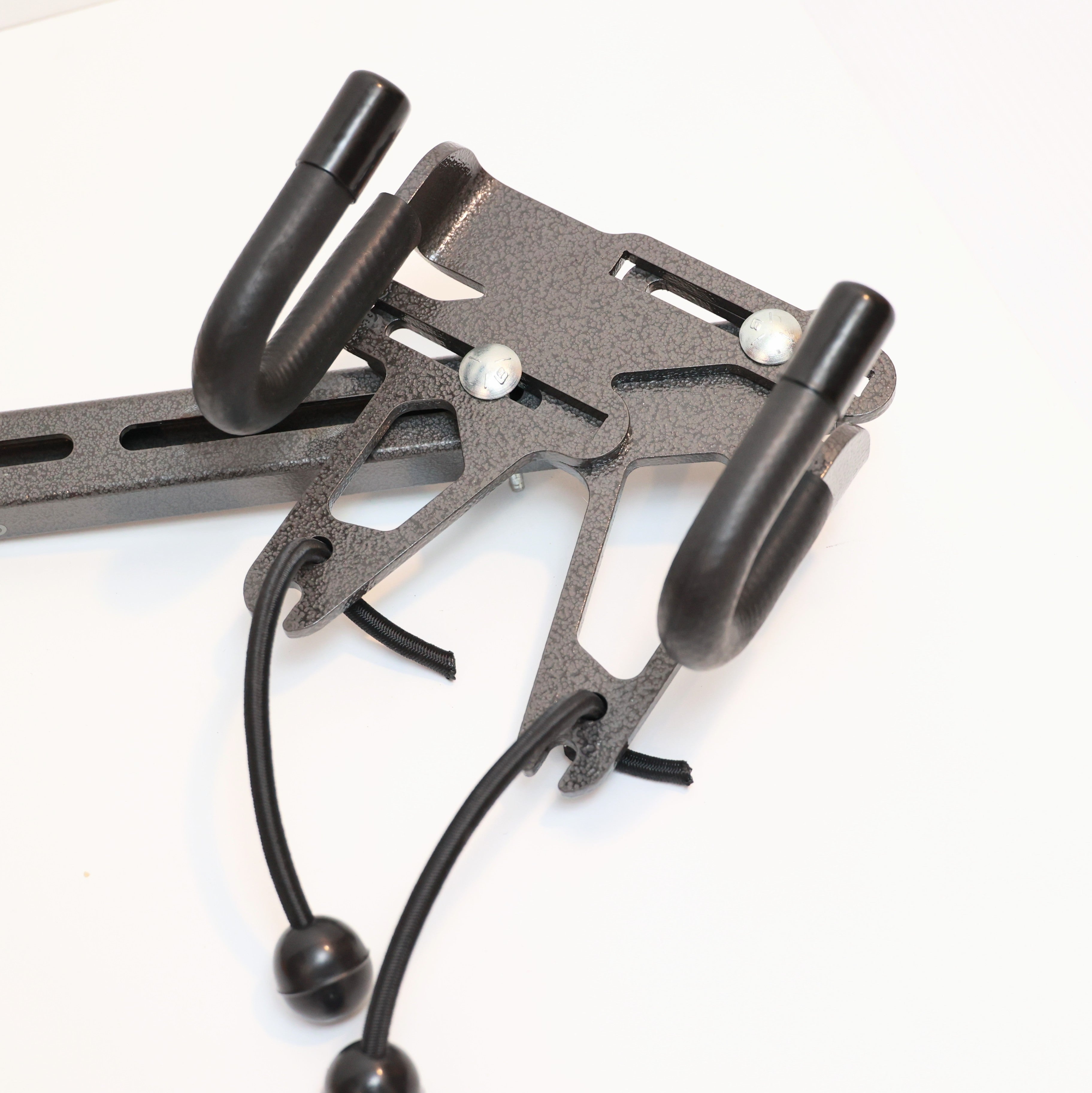 Lolo Racks DIY bike and e-bike compatible attachment carrier, showing metal rack part with mounting brackets for bicycle accessories.