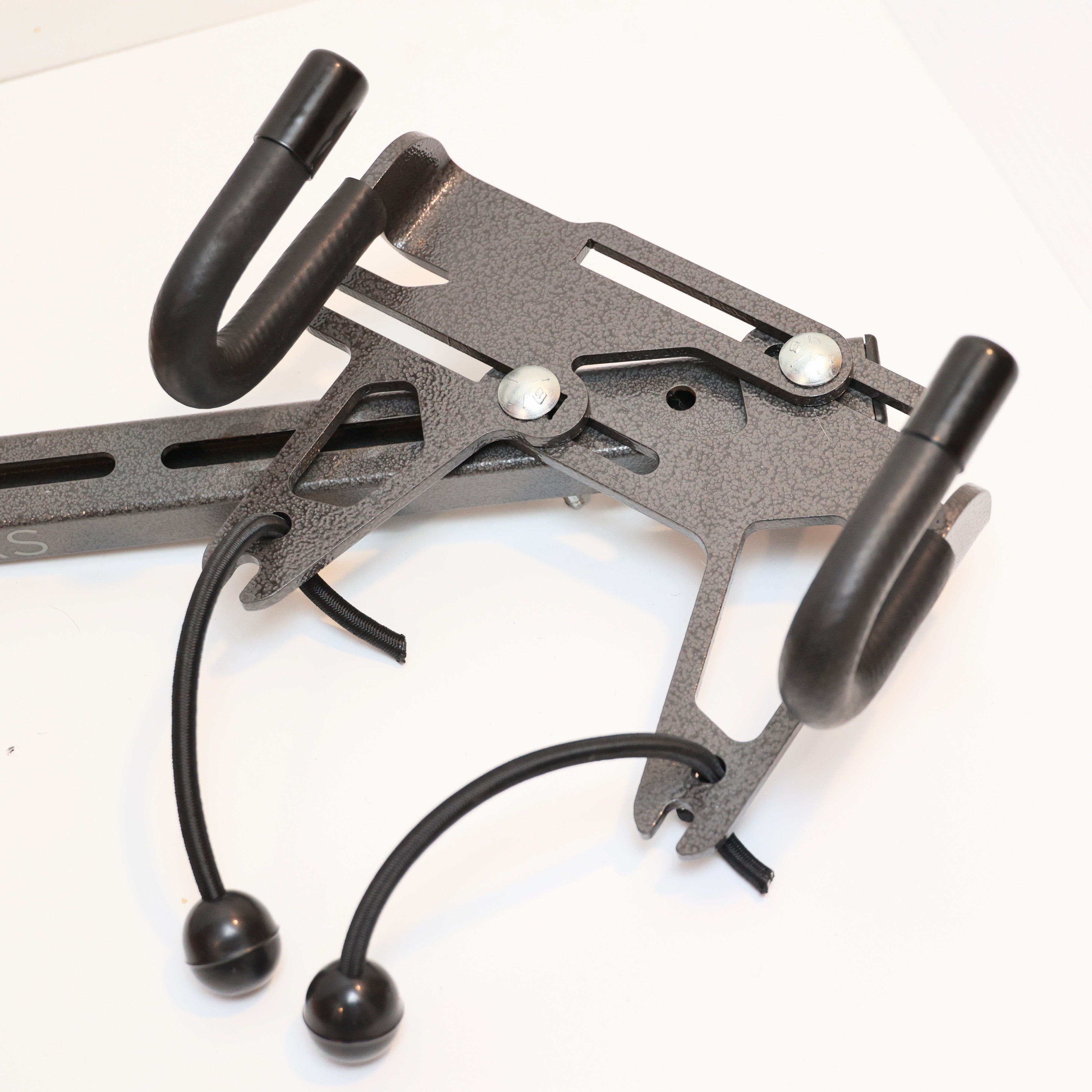Lolo Racks DIY bike and e-bike compatible attachment carrier mounted on a bicycle, showcasing versatile rack accessory for bike storage.