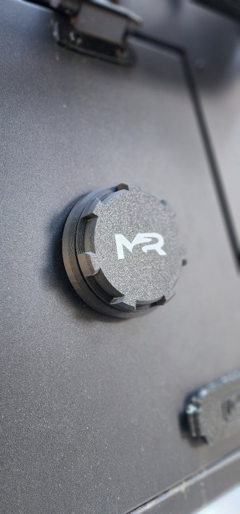 Muddy River Outdoors diesel heater port for campers and toppers, designed for efficient heat pass-through in outdoor settings.