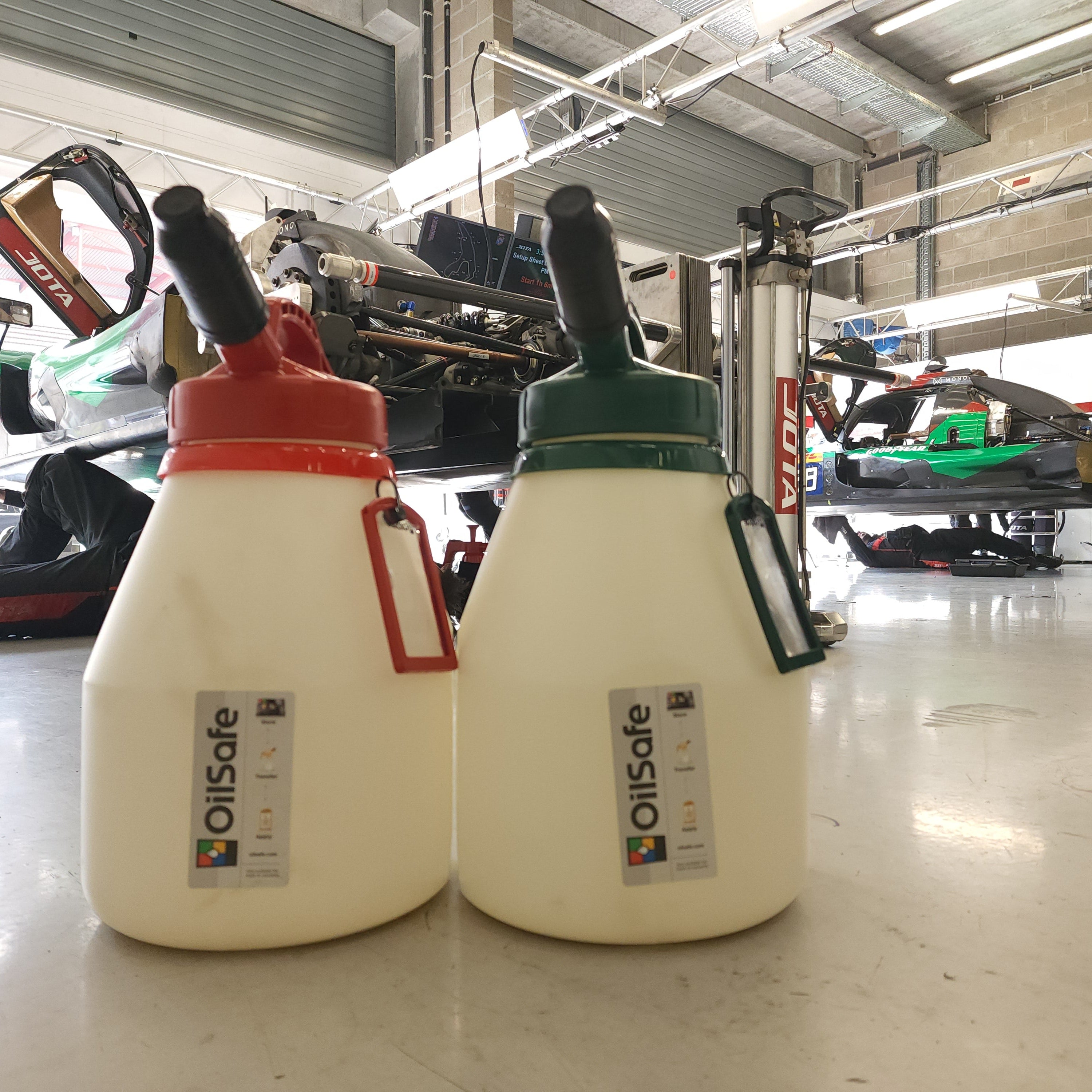 OilSafe DRIVEN Racing Shop 20B330 oil and fluid transfer container with a durable drum for safe fluid transfer.
