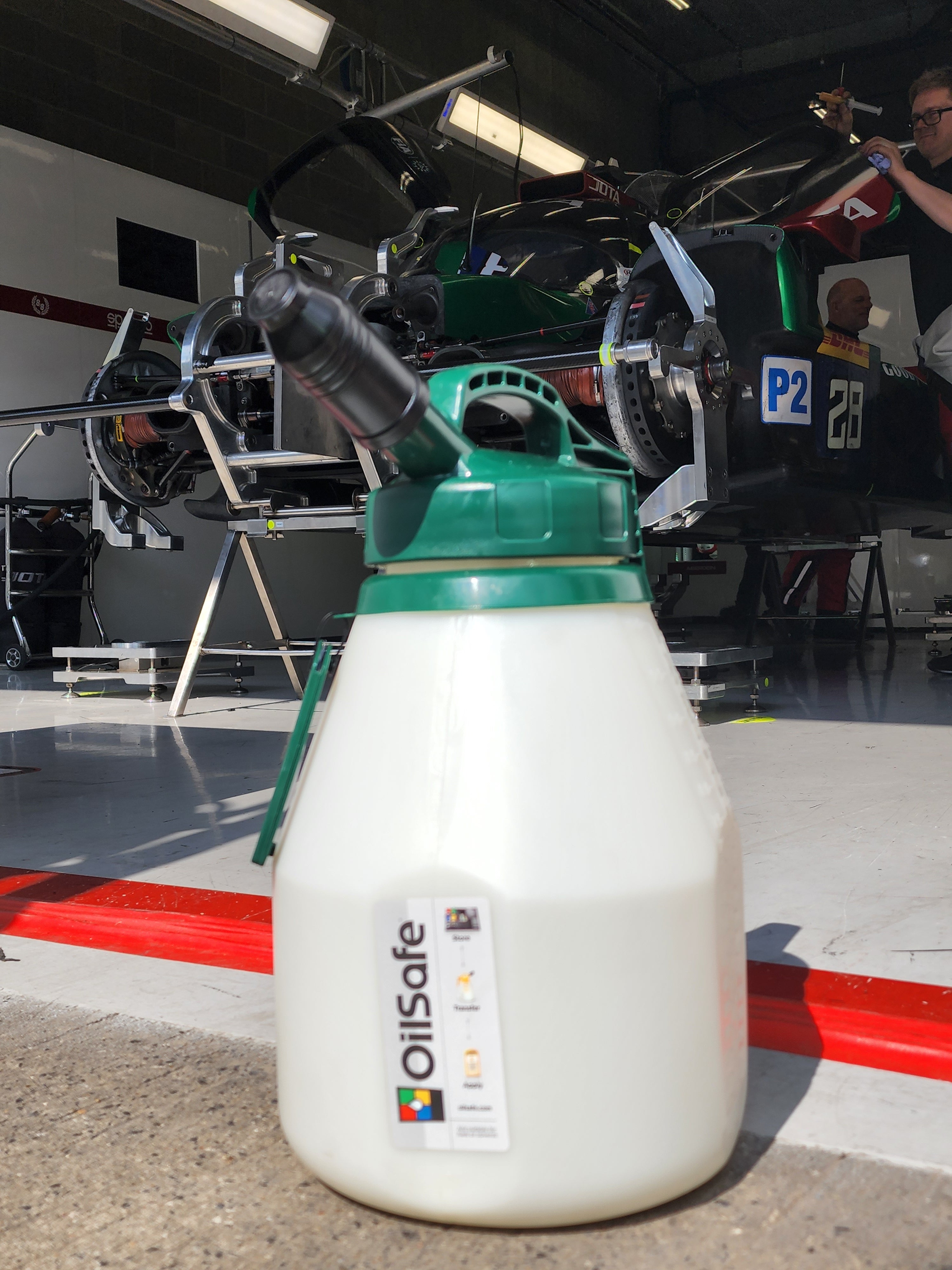 DRIVEN OILSAFE Stumpy Spout transfer container with high-flow lid for oil and fluid transfer, durable plastic construction.