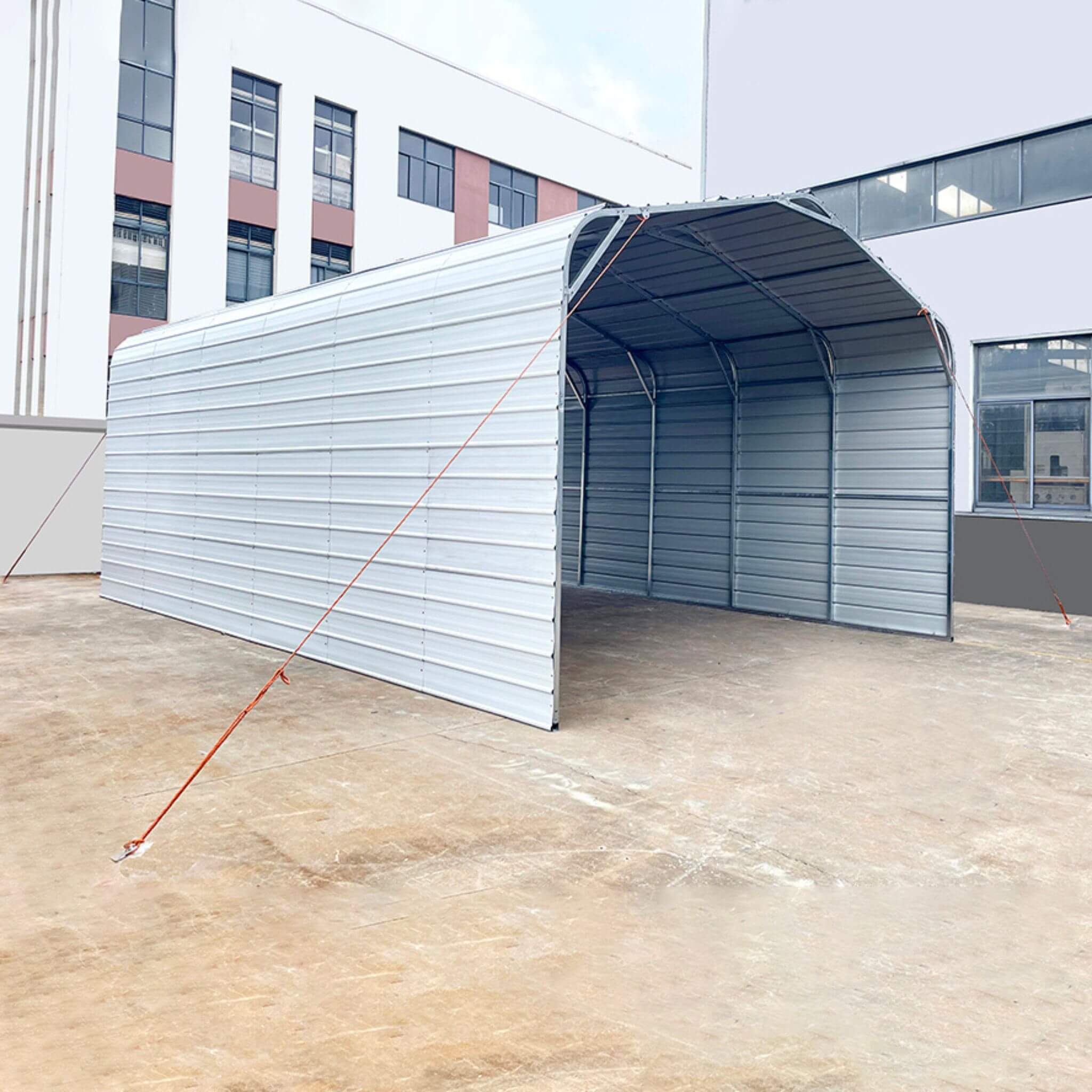 Heavy-duty outdoor galvanized steel carport measuring 20x30 feet, durable shelter from SAKSBY WHOLESALE.