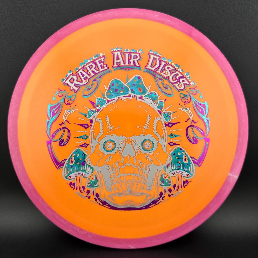 Fission Defy Crushin' Amanitas VIP 2.0 disc golf disc by Rare Air Discs featuring vibrant colors and detailed graphics