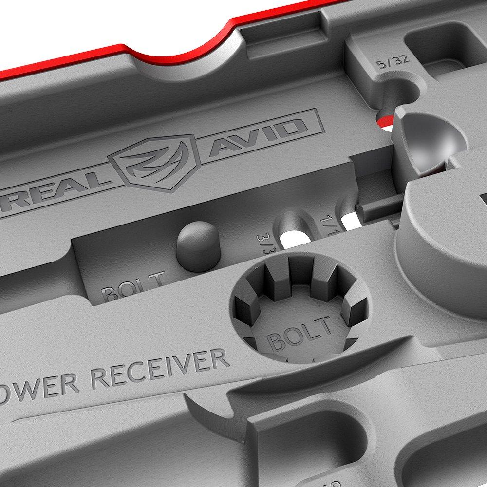 HCC Tactical AR15 Master Bench Block used for firearm cleaning and maintenance, with multiple slots for cleaning pins and tools.