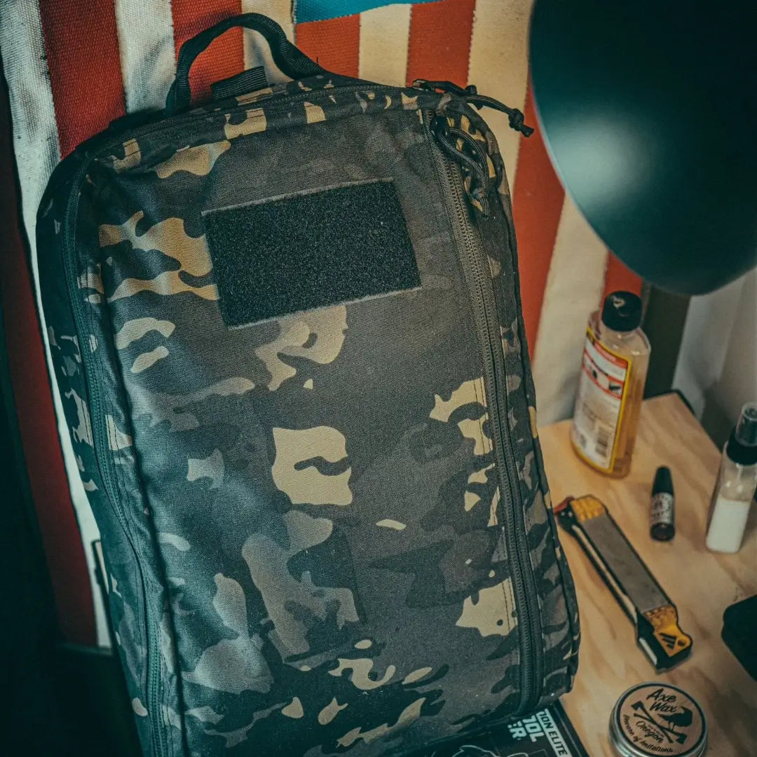 Recycled Firefighter 24 Hour Backpack in 500D material with multiple compartments and black color, designed for durability and utility.