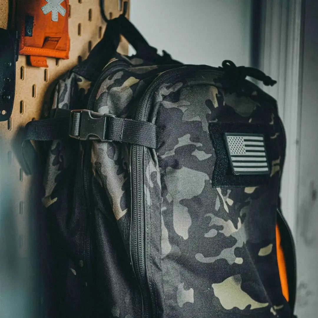 Recycled Firefighter 12 Hour Plus backpack made of durable 500D material with multiple compartments and padded straps.