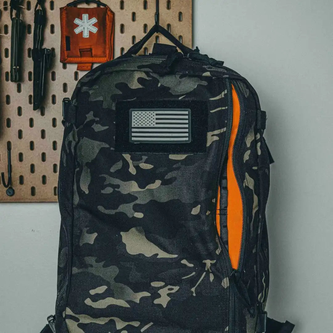 Recycled Firefighter 12 Hour Plus backpack with durable 24-hour storage and multiple compartments in black nylon fabric