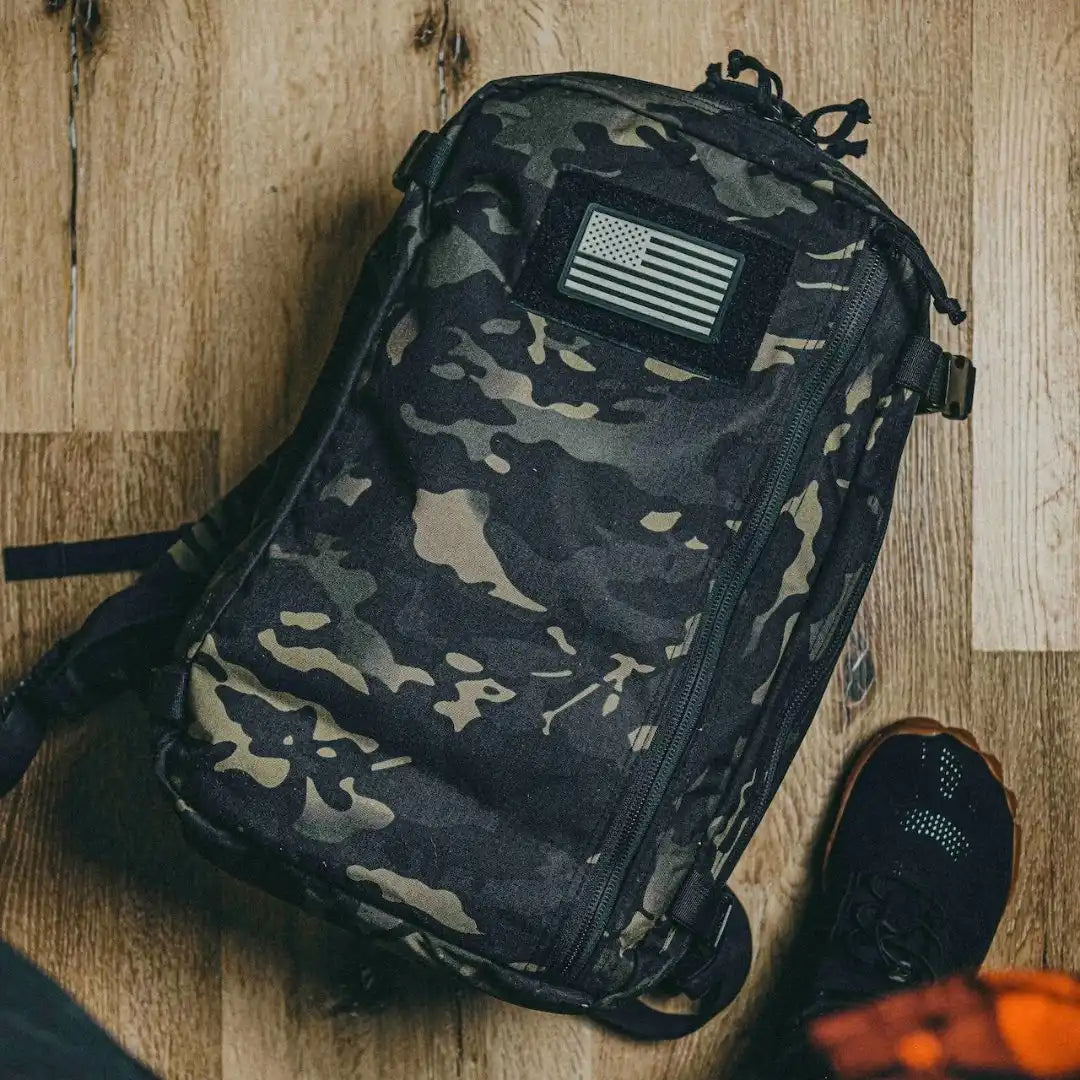 Recycled Firefighter 12 Hour Plus backpack with durable 24-hour design, featuring multiple compartments and sturdy straps.