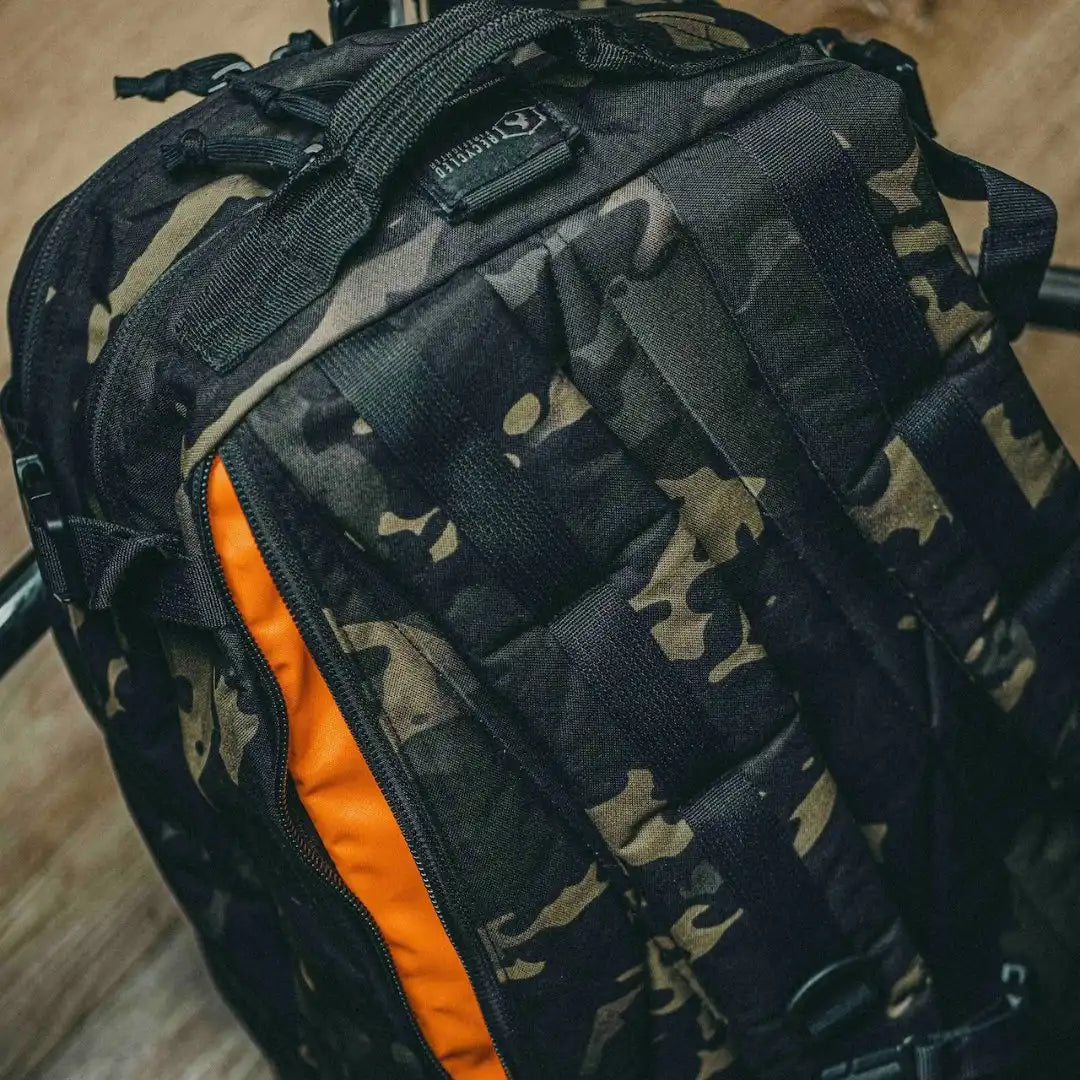 Recycled Firefighter 24 Hour PLUS backpack in durable 500D material with multiple compartments and padded straps.