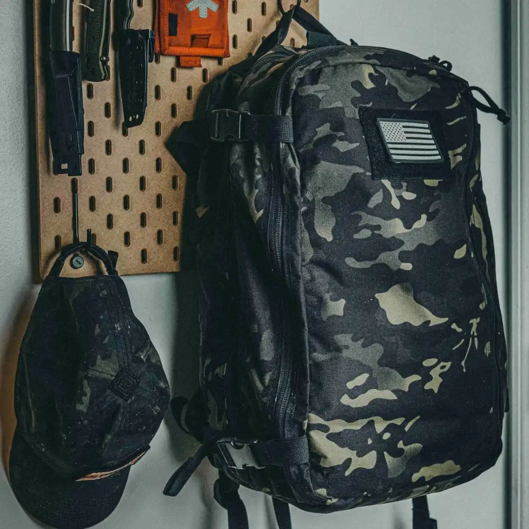 Recycled Firefighter 12 Hour Plus Backpack made of durable 500D material, featuring multiple compartments and padded straps.