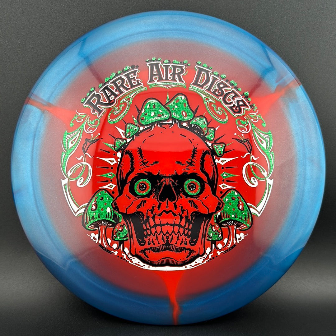 Rare Air Discs Halo S-Blend Conqueror disc golf disc featuring a colorful, detailed design with the Crushin' Amanitas motif.
