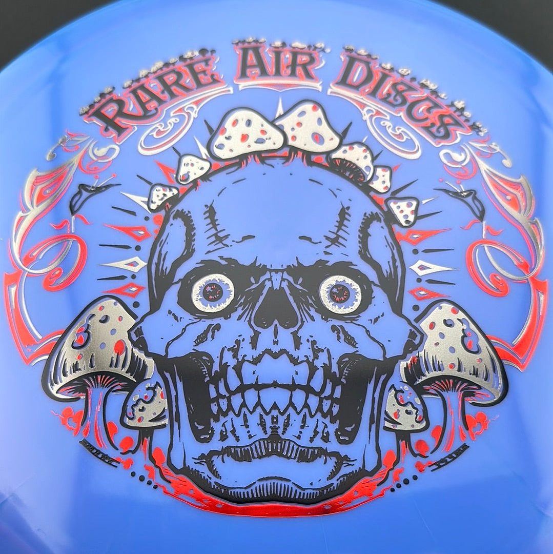 Ethereal Construct Crushin' Amanitas disc golf stamp by Manny Trujillo on a Rare Air Discs disc, featuring colorful mushroom artwork.