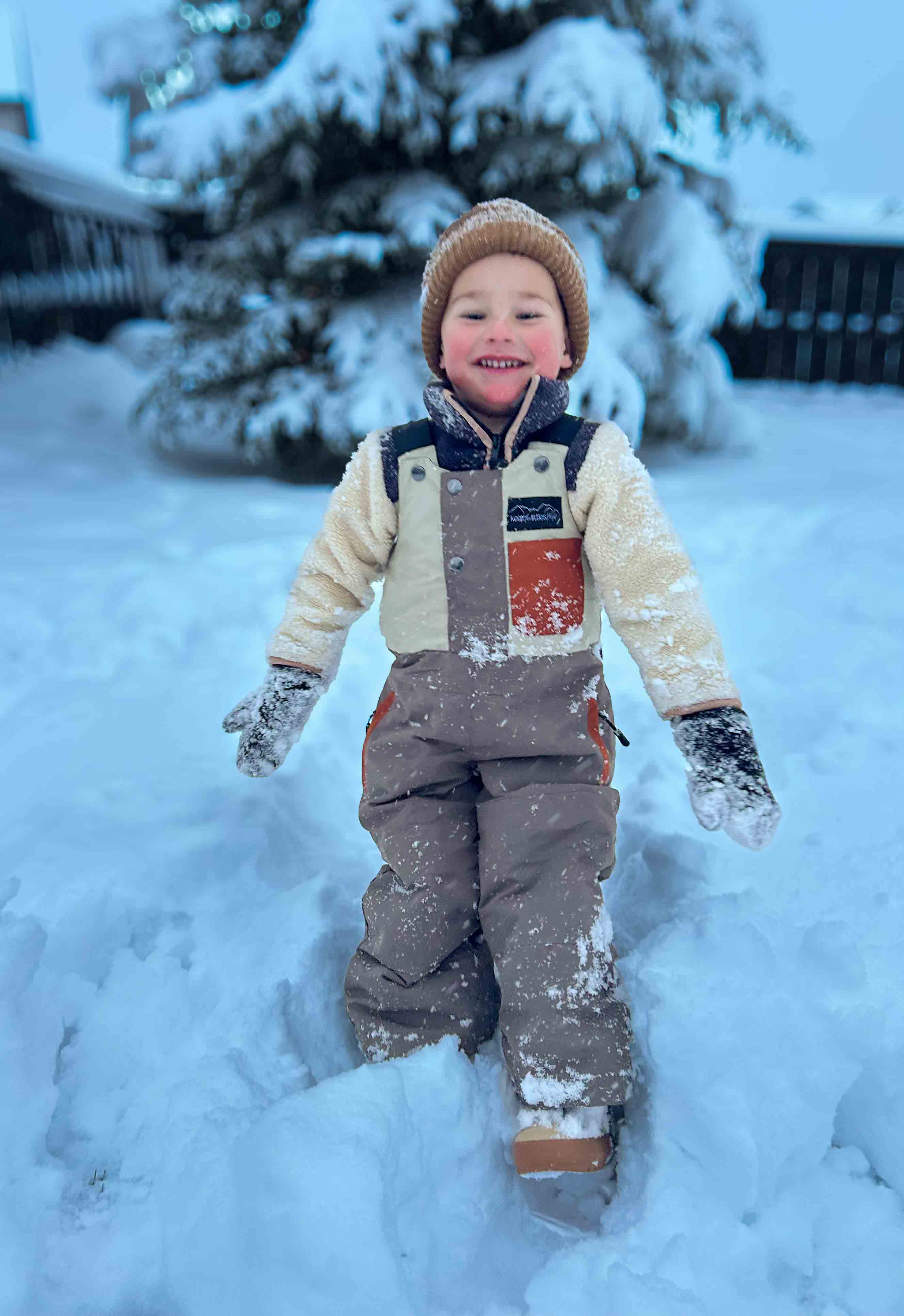 Youth waterproof snow bib by Keep the Littles Wild, featuring adjustable straps and insulated material for cold winter weather.