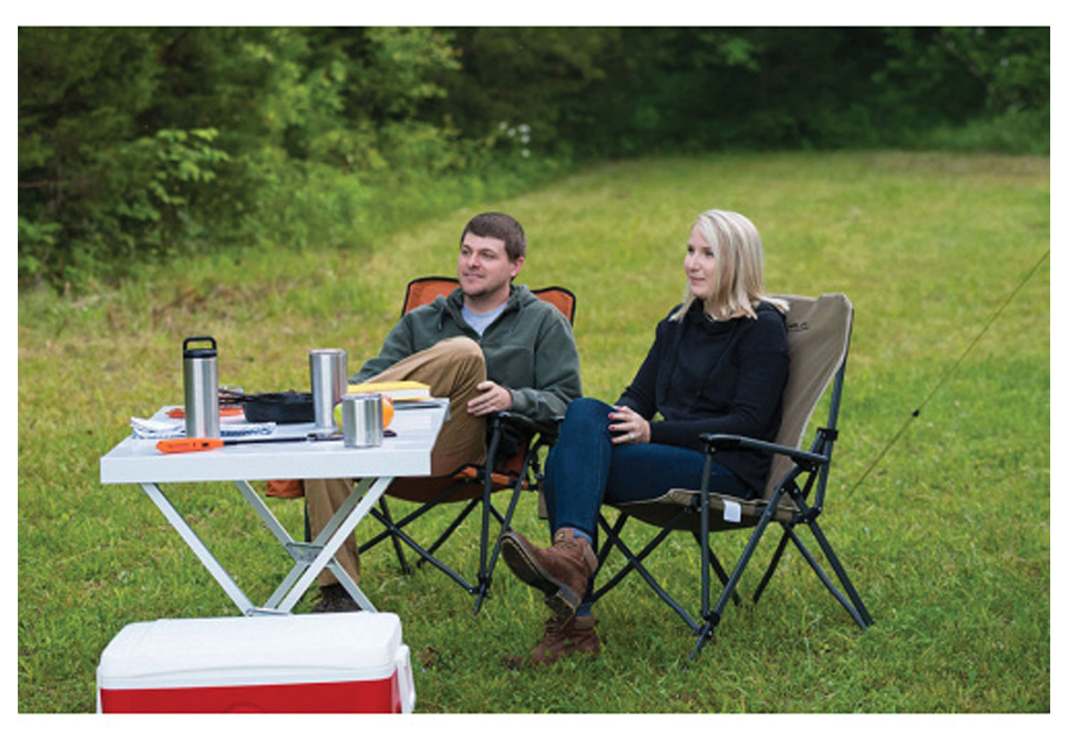 Backcountry Sportsman camping dining table in silver with four sturdy legs, designed for outdoor use and portable setup.