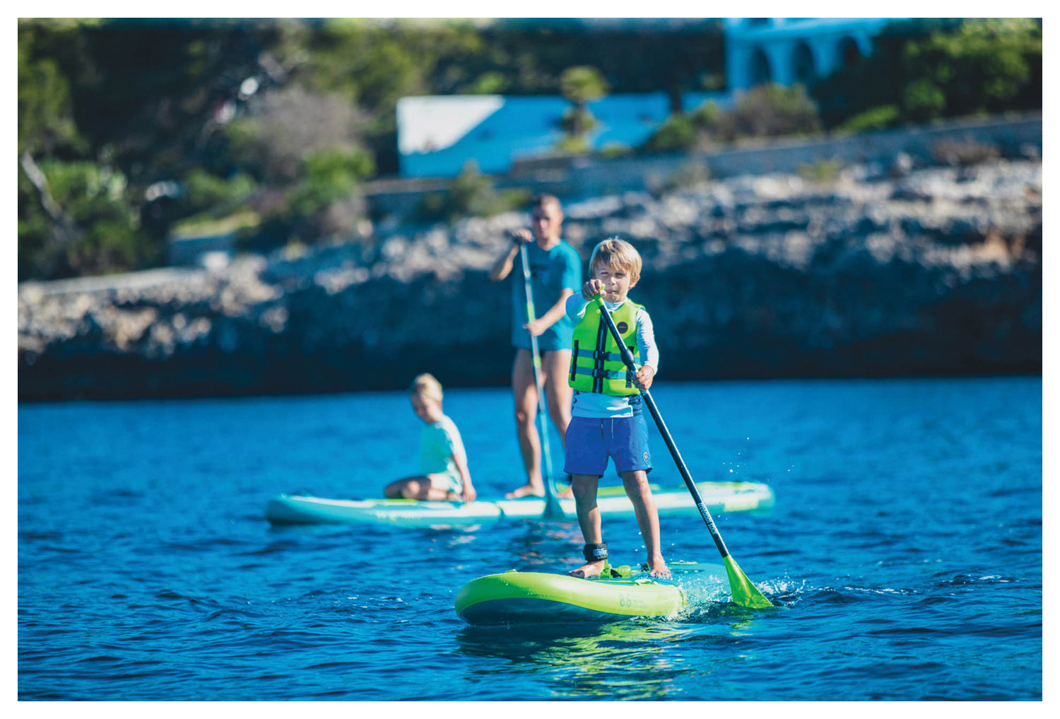 Backcountry Sportsman Yama 8.6 inflatable paddle board on water, showing its sleek shape and durable construction.
