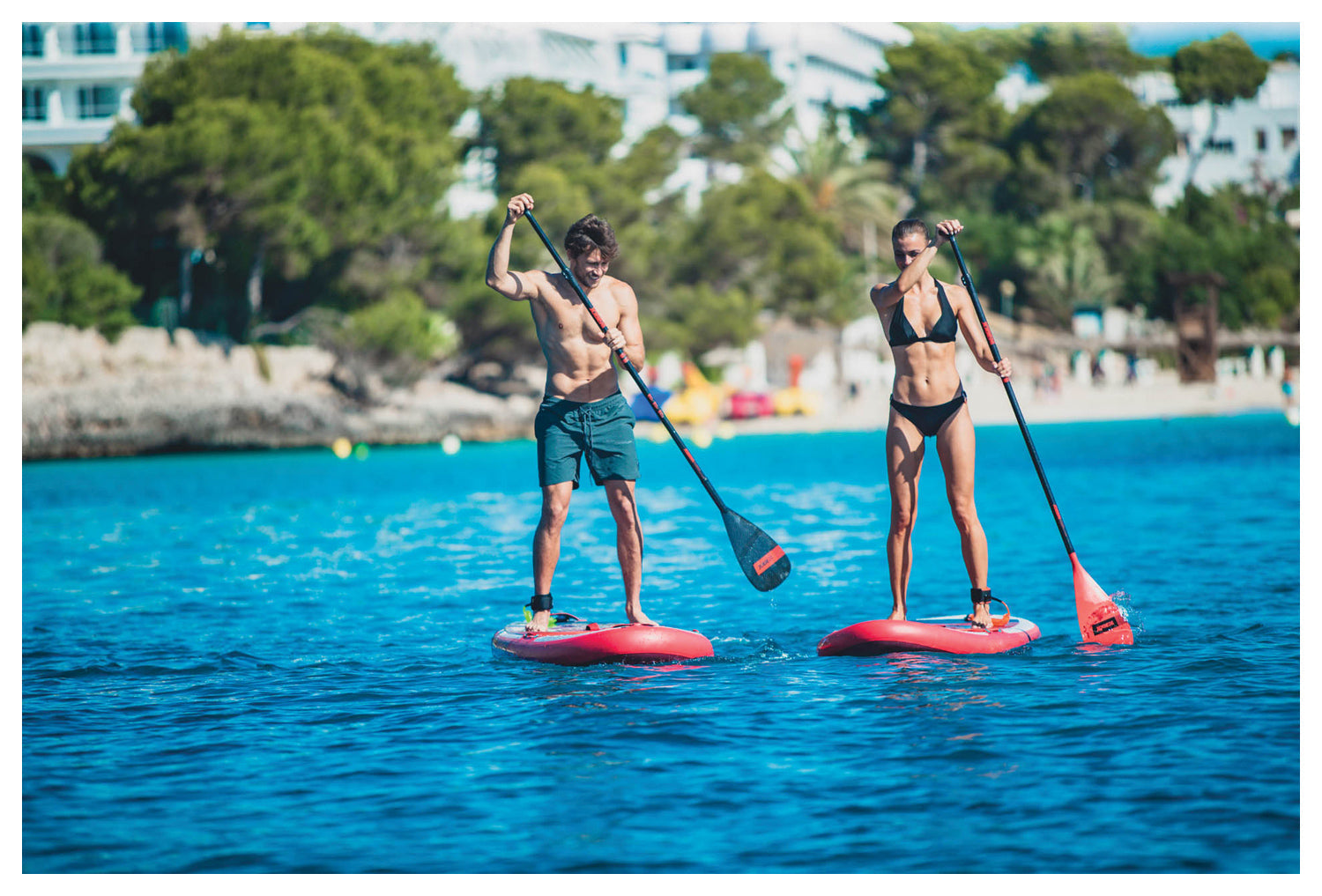 Backcountry Sportsman Mira 10.0 inflatable paddle board on water, showcasing its sleek design and stability features.