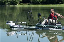 Backcountry Sportsman FS1210 FishSUP inflatable fishing stand-up paddleboard with Watersnake motor package on water.