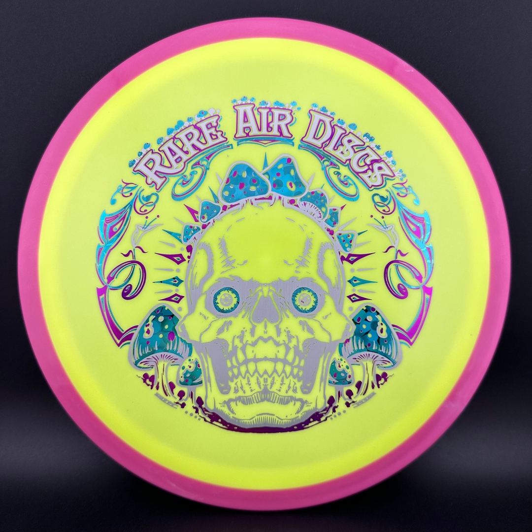 Rare Air Discs Fission Defy Crushin' Amanitas VIP 2.0 disc golf disc with vibrant design and sturdy construction.