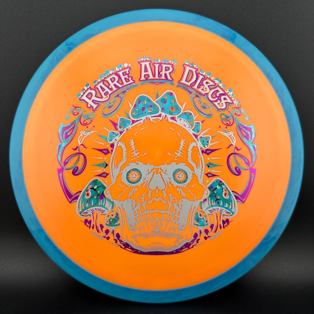 Rare Air Discs Fission Defy Crushin' Amanitas VIP 2.0 disc golf disc with vibrant design and detailed artwork.