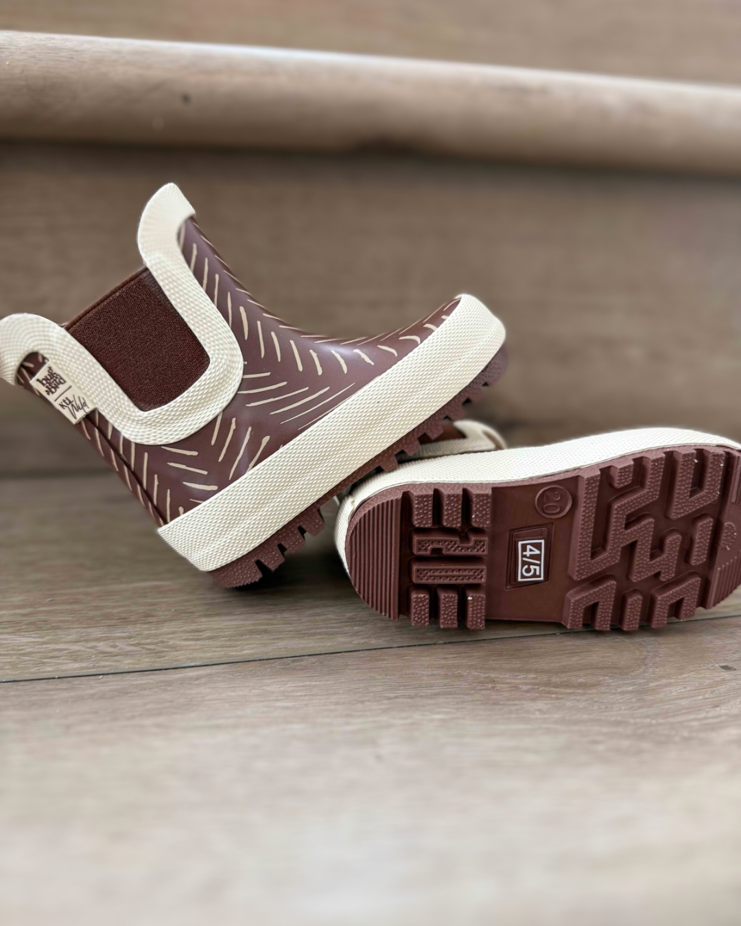 Keep the Littles Wild Summit Rain Boots in vibrant colors, shown with waterproof material and sturdy soles for wet weather.
