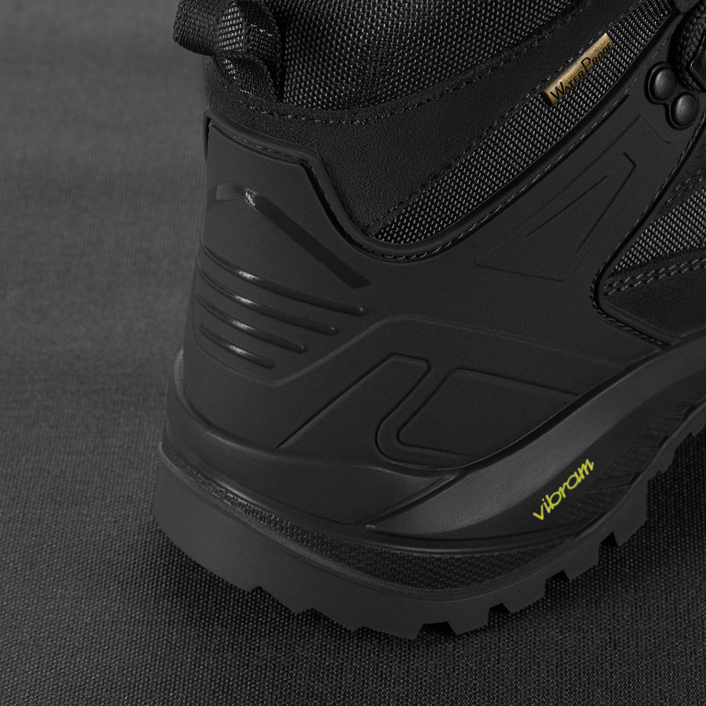 M-Tac Demi-Season Tactical Boots in black with durable leather and textile upper, rugged sole, designed for tactical and outdoor use.